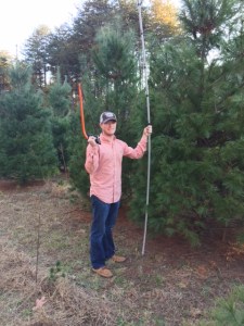 Drew all ready to cut down the Christmas tree